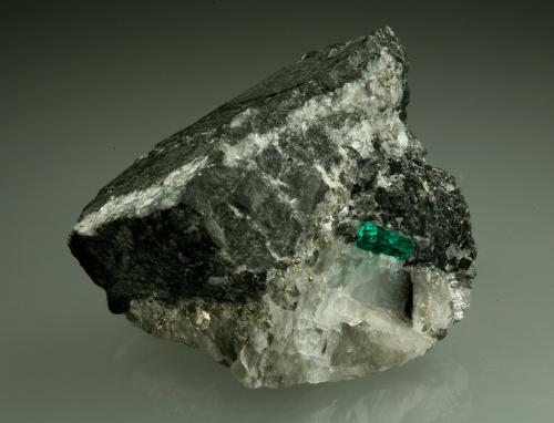 Beryl (variety emerald), Calcite, Pyrite<br />Coscuez mining district, Municipio San Pablo de Borbur, Western Emerald Belt, Boyacá Department, Colombia<br />43x38x50mm,  xl=11mm<br /> (Author: Fiebre Verde)