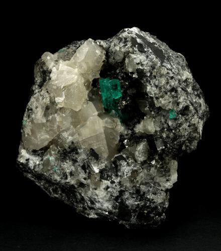 Beryl (variety emerald), Calcite<br />La Pita mining district, Municipio Maripí, Western Emerald Belt, Boyacá Department, Colombia<br />9cm across, xls=20mm<br /> (Author: Fiebre Verde)