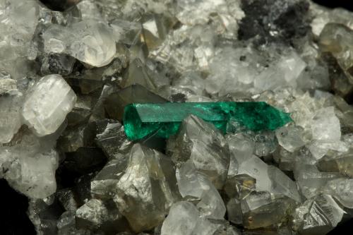 Beryl (variety emerald), Calcite, Pyrite<br />Chivor mining district, Municipio Chivor, Eastern Emerald Belt, Boyacá Department, Colombia<br />65x50x70mm, xl=18mm<br /> (Author: Fiebre Verde)