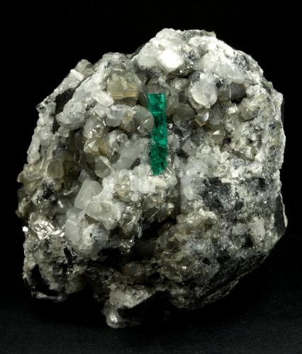 Beryl (variety emerald), Calcite, Pyrite<br />Chivor mining district, Municipio Chivor, Eastern Emerald Belt, Boyacá Department, Colombia<br />65x50x70mm, xl=18mm<br /> (Author: Fiebre Verde)