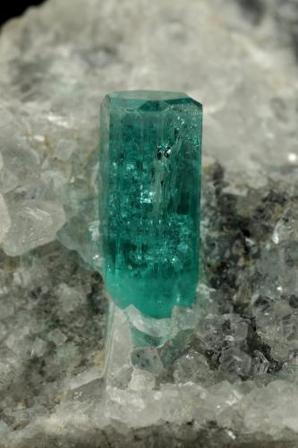 Beryl (variety emerald), Calcite<br />Chivor mining district, Municipio Chivor, Eastern Emerald Belt, Boyacá Department, Colombia<br />65x50x40mm, xl=10mm<br /> (Author: Fiebre Verde)