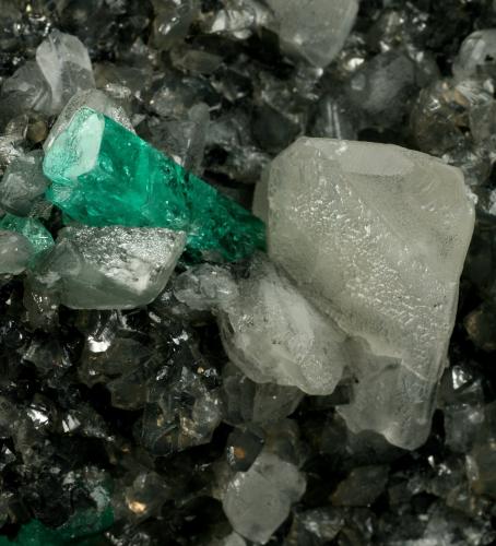 Beryl (variety emerald), Calcite, Pyrite<br />Coscuez mining district, Municipio San Pablo de Borbur, Western Emerald Belt, Boyacá Department, Colombia<br />95x75x75mm, xl=15mm<br /> (Author: Fiebre Verde)