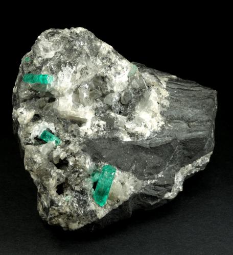 Beryl (variety emerald), Calcite<br />La Pita mining district, Municipio Maripí, Western Emerald Belt, Boyacá Department, Colombia<br />100x50x70mm, largest xl=17mm<br /> (Author: Fiebre Verde)