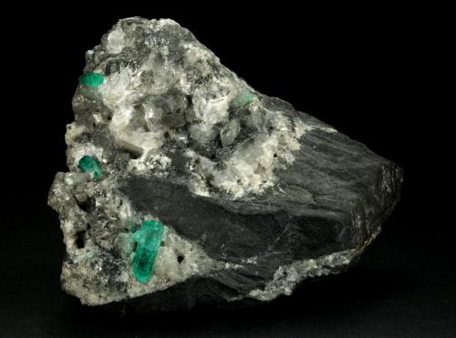 Beryl (variety emerald), Calcite<br />La Pita mining district, Municipio Maripí, Western Emerald Belt, Boyacá Department, Colombia<br />100x50x70mm, largest xl=17mm<br /> (Author: Fiebre Verde)