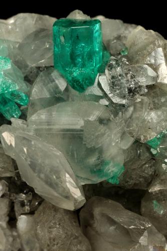 Beryl (variety emerald), Calcite, Quartz<br />La Pita (distrito minero), Mina Polveros, Municipio Maripí, Cinturón Esmeraldífero Occidental, Departamento Boyacá, Colombia<br />53x51x40mm, xl=9mm<br /> (Author: Fiebre Verde)