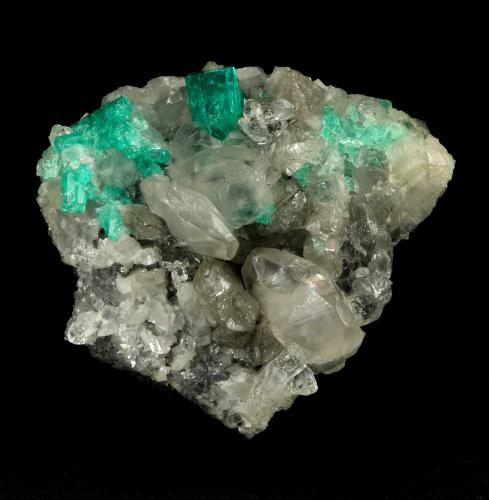 Beryl (variety emerald), Calcite, Quartz<br />La Pita mining district, Polveros Mine, Municipio Maripí, Western Emerald Belt, Boyacá Department, Colombia<br />53x51x40mm, xl=9mm<br /> (Author: Fiebre Verde)