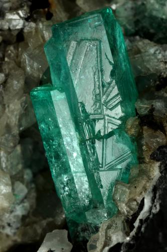 Beryl (variety emerald), Calcite<br />La Pita mining district, Polveros Mine, Municipio Maripí, Western Emerald Belt, Boyacá Department, Colombia<br />115x75x115mm, xl=20mm<br /> (Author: Fiebre Verde)