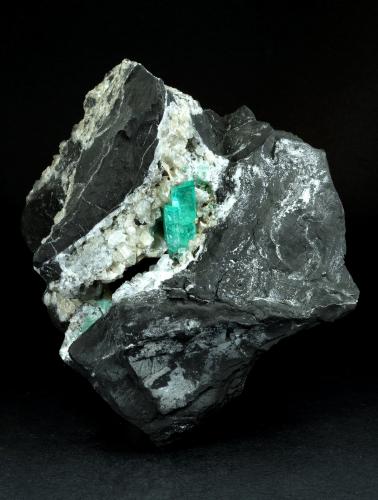 Beryl (variety emerald), Calcite<br />La Pita mining district, Polveros Mine, Municipio Maripí, Western Emerald Belt, Boyacá Department, Colombia<br />115x75x115mm, xl=20mm<br /> (Author: Fiebre Verde)