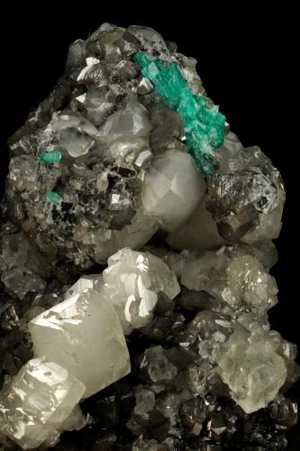 Beryl (variety emerald), Calcite, Fluorite<br />La Pita (distrito minero), Municipio Maripí, Cinturón Esmeraldífero Occidental, Departamento Boyacá, Colombia<br />170x120x95mm, aggregate=50x22mm<br /> (Author: Fiebre Verde)