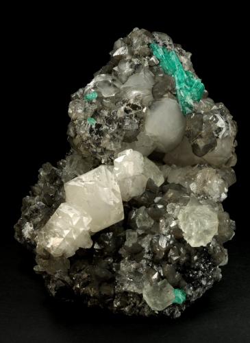 Beryl (variety emerald), Calcite, Fluorite<br />La Pita mining district, Municipio Maripí, Western Emerald Belt, Boyacá Department, Colombia<br />170x120x95mm, aggregate=50x22mm<br /> (Author: Fiebre Verde)