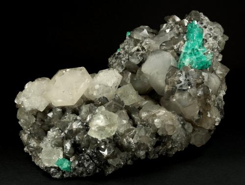 Beryl (variety emerald), Calcite, Fluorite<br />La Pita mining district, Municipio Maripí, Western Emerald Belt, Boyacá Department, Colombia<br />170x120x95mm, aggregate=50x22mm<br /> (Author: Fiebre Verde)