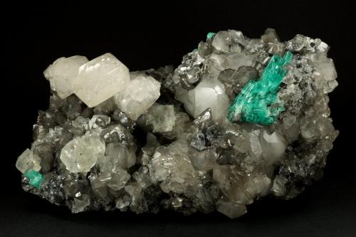 Beryl (variety emerald), Calcite, Fluorite<br />La Pita mining district, Municipio Maripí, Western Emerald Belt, Boyacá Department, Colombia<br />170x120x95mm, aggregate=50x22mm<br /> (Author: Fiebre Verde)