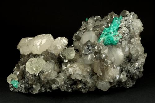 Beryl (variety emerald), Calcite, Fluorite<br />La Pita mining district, Municipio Maripí, Western Emerald Belt, Boyacá Department, Colombia<br />170x120x95mm, aggregate=50x22mm<br /> (Author: Fiebre Verde)