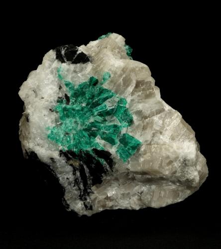 Beryl (variety emerald), Calcite<br />La Pita mining district, Municipio Maripí, Western Emerald Belt, Boyacá Department, Colombia<br />7cm across<br /> (Author: Fiebre Verde)