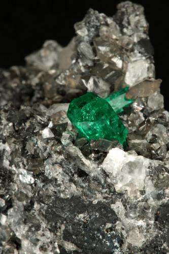 Beryl (variety emerald), Calcite<br />La Pita mining district, Municipio Maripí, Western Emerald Belt, Boyacá Department, Colombia<br />83x27x62mm, xl=9mm<br /> (Author: Fiebre Verde)