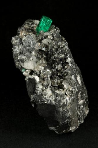 Beryl (variety emerald), Calcite<br />La Pita mining district, Municipio Maripí, Western Emerald Belt, Boyacá Department, Colombia<br />83x27x62mm, xl=9mm<br /> (Author: Fiebre Verde)