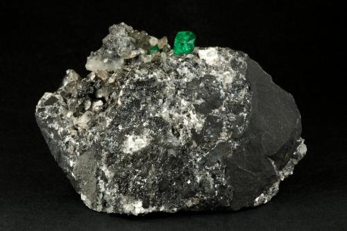Beryl (variety emerald), Calcite<br />La Pita mining district, Municipio Maripí, Western Emerald Belt, Boyacá Department, Colombia<br />83x27x62mm, xl=9mm<br /> (Author: Fiebre Verde)