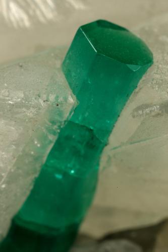 Beryl (variety emerald), Calcite<br />La Pita mining district, Polveros Mine, Municipio Maripí, Western Emerald Belt, Boyacá Department, Colombia<br />90x60x65mm, xl=16mm<br /> (Author: Fiebre Verde)