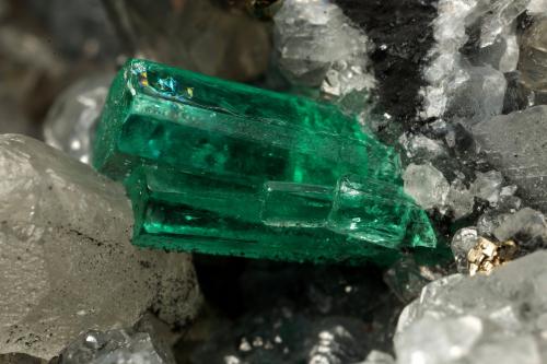 Beryl (variety emerald), Calcite, Pyrite<br />La Pita mining district, Municipio Maripí, Western Emerald Belt, Boyacá Department, Colombia<br />54x36x60mm, xl=8mm<br /> (Author: Fiebre Verde)