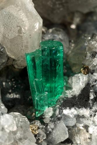 Beryl (variety emerald), Calcite, Pyrite<br />La Pita mining district, Municipio Maripí, Western Emerald Belt, Boyacá Department, Colombia<br />54x36x60mm, xl=8mm<br /> (Author: Fiebre Verde)