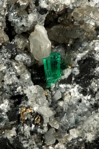 Beryl (variety emerald), Calcite, Pyrite<br />La Pita mining district, Municipio Maripí, Western Emerald Belt, Boyacá Department, Colombia<br />54x36x60mm, xl=8mm<br /> (Author: Fiebre Verde)