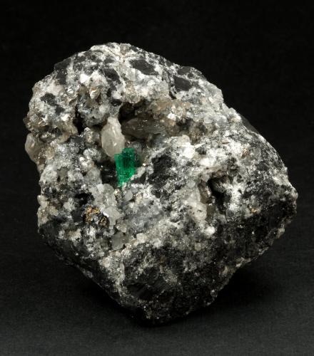 Beryl (variety emerald), Calcite, Pyrite<br />La Pita mining district, Municipio Maripí, Western Emerald Belt, Boyacá Department, Colombia<br />54x36x60mm, xl=8mm<br /> (Author: Fiebre Verde)