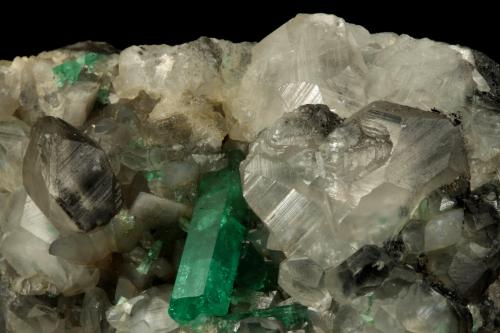 Beryl (variety emerald), Calcite<br />La Pita mining district, Polveros Mine, Municipio Maripí, Western Emerald Belt, Boyacá Department, Colombia<br />110x85x85mm, xl=30mm<br /> (Author: Fiebre Verde)