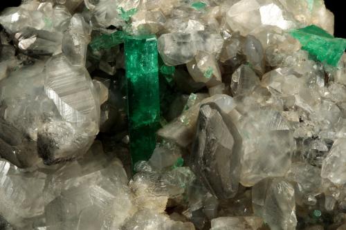 Beryl (variety emerald), Calcite<br />La Pita mining district, Polveros Mine, Municipio Maripí, Western Emerald Belt, Boyacá Department, Colombia<br />110x85x85mm, xl=30mm<br /> (Author: Fiebre Verde)