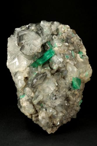 Beryl (variety emerald), Calcite<br />La Pita mining district, Polveros Mine, Municipio Maripí, Western Emerald Belt, Boyacá Department, Colombia<br />110x85x85mm, xl=30mm<br /> (Author: Fiebre Verde)