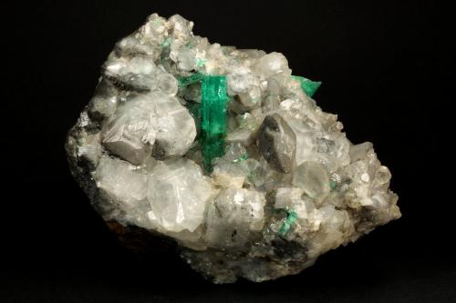 Beryl (variety emerald), Calcite<br />La Pita mining district, Polveros Mine, Municipio Maripí, Western Emerald Belt, Boyacá Department, Colombia<br />110x85x85mm, xl=30mm<br /> (Author: Fiebre Verde)