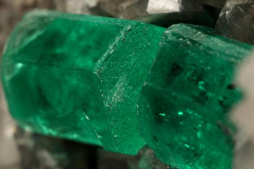 Beryl (variety emerald), Calcite<br />La Pita mining district, Municipio Maripí, Western Emerald Belt, Boyacá Department, Colombia<br />60x55x80mm, xl=6+8mm<br /> (Author: Fiebre Verde)