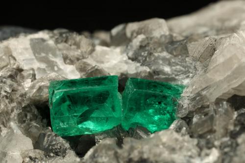 Beryl (variety emerald), Calcite<br />La Pita mining district, Municipio Maripí, Western Emerald Belt, Boyacá Department, Colombia<br />60x55x80mm, xl=6+8mm<br /> (Author: Fiebre Verde)