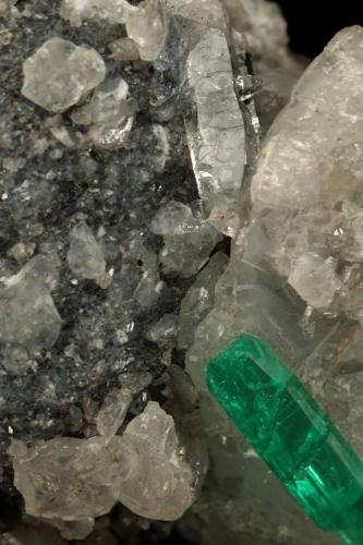 Beryl (variety emerald), Calcite, Pyrite, Quartz<br />Muzo mining district, Western Emerald Belt, Boyacá Department, Colombia<br />105x65x60mm, xl=24mm<br /> (Author: Fiebre Verde)