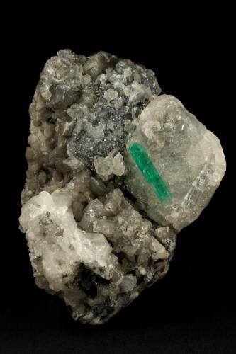 Beryl (variety emerald), Calcite, Pyrite, Quartz<br />Muzo mining district, Western Emerald Belt, Boyacá Department, Colombia<br />105x65x60mm, xl=24mm<br /> (Author: Fiebre Verde)