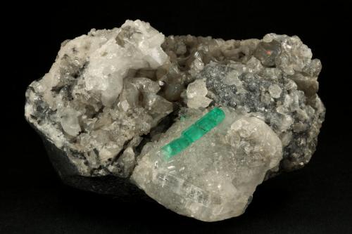 Beryl (variety emerald), Calcite, Pyrite, Quartz<br />Muzo mining district, Western Emerald Belt, Boyacá Department, Colombia<br />105x65x60mm, xl=24mm<br /> (Author: Fiebre Verde)