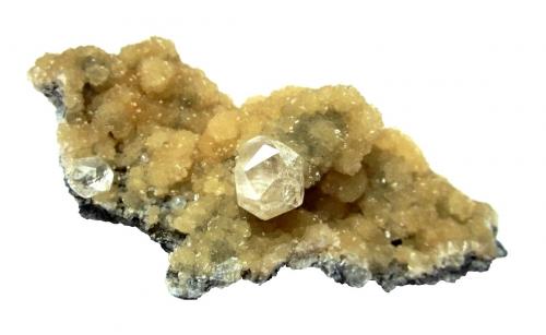 Calcite on stilbite<br />Sokolovskoe Mine (Sokolovskiy Mine), Rudny, Kostanay Region, Kazakhstan<br />Central crystal 12 mm, specimen size 8 cm<br /> (Author: Tobi)