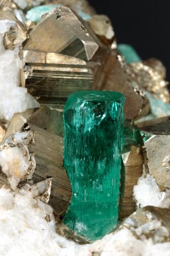 Beryl (variety emerald), Calcite, Pyrite<br />Chivor mining district, Municipio Chivor, Eastern Emerald Belt, Boyacá Department, Colombia<br />102x36x87mm, xl=13mm<br /> (Author: Fiebre Verde)