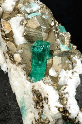 Beryl (variety emerald), Calcite, Pyrite<br />Chivor mining district, Municipio Chivor, Eastern Emerald Belt, Boyacá Department, Colombia<br />102x36x87mm, xl=13mm<br /> (Author: Fiebre Verde)