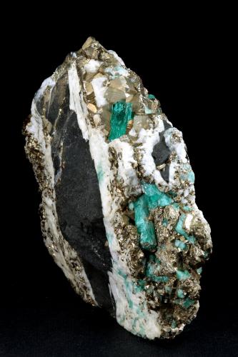 Beryl (variety emerald), Calcite, Pyrite<br />Chivor mining district, Municipio Chivor, Eastern Emerald Belt, Boyacá Department, Colombia<br />102x36x87mm, xl=13mm<br /> (Author: Fiebre Verde)