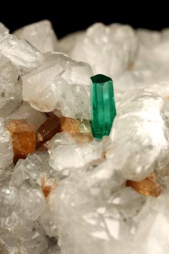 Beryl (variety emerald), Calcite, Parisite<br />La Pita mining district, Municipio Maripí, Western Emerald Belt, Boyacá Department, Colombia<br />8x8x8cm, H35mm, xl=8mm<br /> (Author: Fiebre Verde)