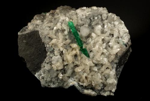 Beryl (variety emerald), Calcite<br />Muzo mining district, Western Emerald Belt, Boyacá Department, Colombia<br />130x80x150mm, xl=53mm<br /> (Author: Fiebre Verde)