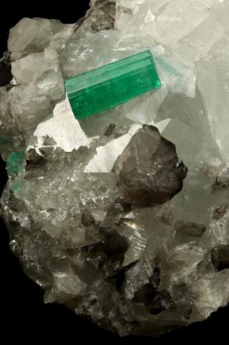 Beryl (variety emerald), Calcite<br />Coscuez mining district, Municipio San Pablo de Borbur, Western Emerald Belt, Boyacá Department, Colombia<br />54x34x50mm, both xls=13mm<br /> (Author: Fiebre Verde)