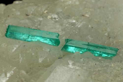 Beryl (variety emerald), Calcite<br />La Pita mining district, Polveros Mine, Municipio Maripí, Western Emerald Belt, Boyacá Department, Colombia<br />75x44x39mm, xl=22mm (combined size)<br /> (Author: Fiebre Verde)