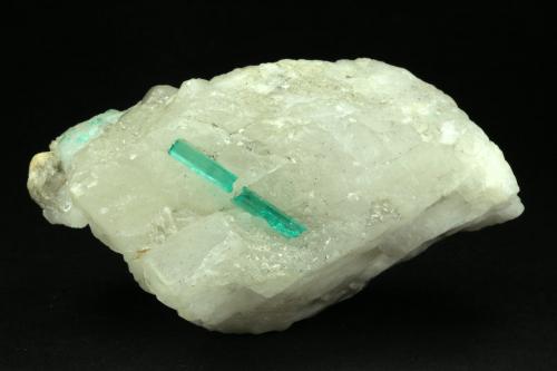 Beryl (variety emerald), Calcite<br />La Pita mining district, Polveros Mine, Municipio Maripí, Western Emerald Belt, Boyacá Department, Colombia<br />75x44x39mm, xl=22mm (combined size)<br /> (Author: Fiebre Verde)