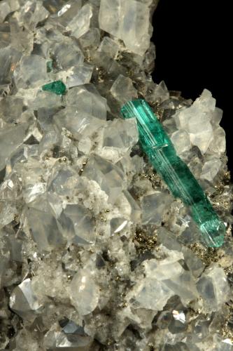 Beryl (variety emerald), Calcite, Pyrite, Dolomite<br />Chivor mining district, Municipio Chivor, Eastern Emerald Belt, Boyacá Department, Colombia<br />98x70x38mm, xl=31mm<br /> (Author: Fiebre Verde)