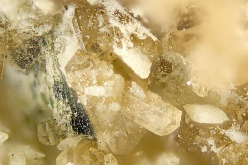 Hilairite<br />Poudrette Quarry, Mont Saint-Hilaire, La Vallée-du-Richelieu RCM, Montérégie, Québec, Canada<br />FOV = 2mm<br /> (Author: Doug)