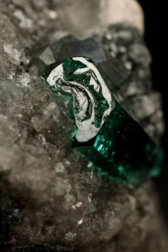 Beryl (variety emerald), Calcite, Dolomite<br />Muzo mining district, Western Emerald Belt, Boyacá Department, Colombia<br />triangle side=35mm, xl=11mm<br /> (Author: Fiebre Verde)