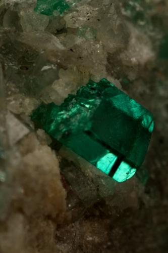 Beryl (variety emerald), Calcite, Dolomite<br />La Pita mining district, Cunas Mine, Municipio Maripí, Western Emerald Belt, Boyacá Department, Colombia<br />42x39x34mm, xls up to 7mm<br /> (Author: Fiebre Verde)