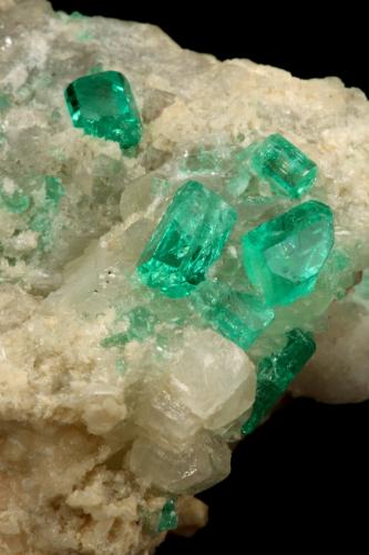 Beryl (variety emerald), Calcite, Dolomite<br />La Pita mining district, Cunas Mine, Municipio Maripí, Western Emerald Belt, Boyacá Department, Colombia<br />42x39x34mm, xls up to 7mm<br /> (Author: Fiebre Verde)