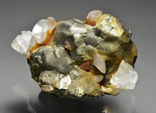 Pyrite, calcite.<br />Stan Trg (Stari Trg) Mine, Trepča Complex, Trepča Valley, Kosovska Mitrovica, Kosovska Mitrovica District, Kosovo<br />7.5 x 6.5 x 6 cm.<br /> (Author: Martin Rich)